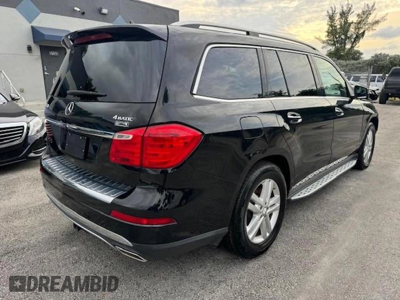 2016 Mercedes-Benz GL with VIN 4JGDF6EE1GA625384, listed as a Copart auction lot 77045634 with 104,938 mi miles and Salvage Title. Bid and sale history available at carsss.com. Image 3.