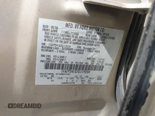 2007 Ford Five Hundred SEL z VIN 1FAFP241X7G119234, wystawiony jako IAAI lot #42142742 z przebiegiem 217 800 mil mil oraz . Historia ofert i sprzedaży dostępna na DreamBid. Obrazek 9.