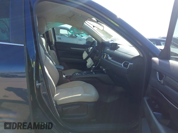 2017 Mazda CX-5 Touring with VIN JM3KFACL1H0192549, listed as a IAAI auction lot 41667781 with 89,030 mi miles. Bid and sale history available at carsss.com. Image 5.