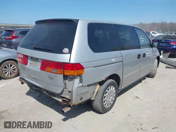 2002 Honda Odyssey LX z VIN 2HKRL18532H567409, wystawiony jako IAAI lot #42069502 z przebiegiem 173 662 mil mil oraz . Historia ofert i sprzedaży dostępna na DreamBid. Obrazek 4.