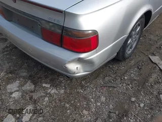 2002 Cadillac Seville Touring STS z VIN 1G6KY54902U102873, wystawiony jako IAAI lot #39710788 z przebiegiem 120 116 mil mil oraz . Historia ofert i sprzedaży dostępna na DreamBid. Obrazek 6.