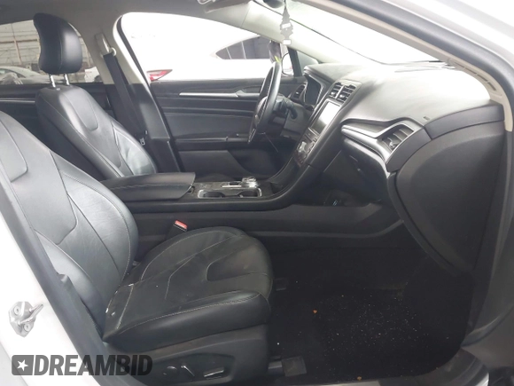 2019 Ford Fusion Titanium with VIN 3FA6P0K90KR236674, listed as a IAAI auction lot 42008633 with 99,737 mi miles and . Bid and sale history available at DreamBid. Image 5.