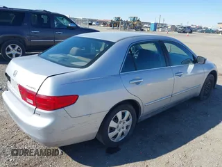 2005 Honda Accord LX with VIN 1HGCM66365A005292, listed as a IAAI auction lot 41555771 with 332,836 mi miles and . Bid and sale history available at DreamBid. Image 4.