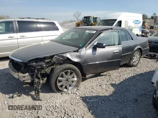 2010 Cadillac DTS 1SD z VIN 1G6KH5EY9AU124603, wystawiony jako Copart lot #47888644 z przebiegiem 179 690 mil mil oraz Szkoda całkowita • Salvage title. Historia ofert i sprzedaży dostępna na DreamBid. Obrazek 1.