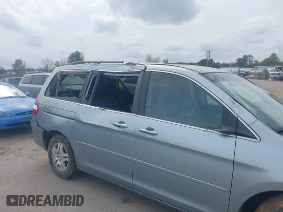 2007 Honda Odyssey EX-L z VIN 5FNRL38757B046761, wystawiony jako IAAI lot #41943033 z przebiegiem 309 270 mil mil oraz . Historia ofert i sprzedaży dostępna na DreamBid. Obrazek 6.