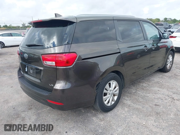 2018 Kia Sedona LX with VIN KNDMB5C15J6382599, listed as a IAAI auction lot 41964769 with 82,494 mi miles. Bid and sale history available at carsss.com. Image 4.