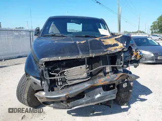 1998 Dodge 1500 with VIN 1B7HF13Z7WJ145413, listed as a IAAI auction lot 42030706 with 198,080 mi miles and . Bid and sale history available at carsss.com. Image 6.