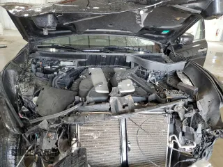 2016 Infiniti QX70 with VIN JN8CS1MW0GM753031, listed as a Copart auction lot 59922585 with 110,236 mi miles and Salvage title. Bid and sale history available at DreamBid. Image 12.