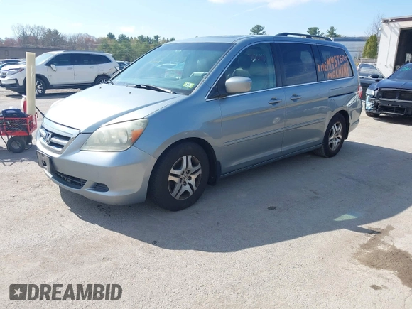 2006 Honda Odyssey EX-L with VIN 5FNRL38656B120539, listed as a IAAI auction lot 42190857 with 242,152 mi miles. Bid and sale history available at carsss.com. Image 2.