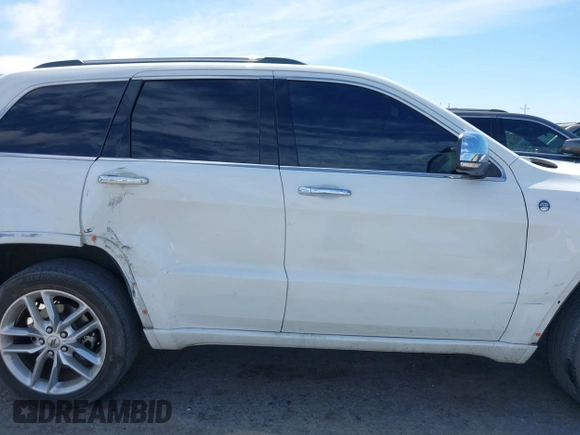 2015 Jeep Grand Cherokee Overland with VIN 1C4RJFCG3FC230185, listed as a IAAI auction lot 42494650 with 123,128 mi miles and . Bid and sale history available at DreamBid. Image 13.