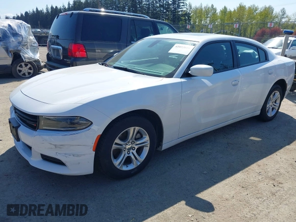 2022 Dodge Charger SXT with VIN 2C3CDXBG4NH197301, listed as a IAAI auction lot 42053688 with 60,592 mi miles and . Bid and sale history available at DreamBid. Image 17.