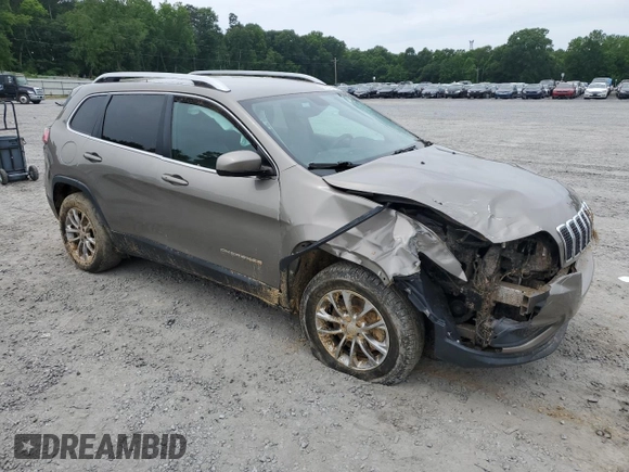 2019 Jeep Cherokee Latitude Plus with VIN 1C4PJMLB2KD169934, listed as a Copart auction lot 57332795 with 110,549 mi miles and Salvage title. Bid and sale history available at DreamBid. Image 4.