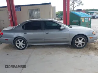 2004 Infiniti I35 z VIN JNKDA31AX4T202421, wystawiony jako IAAI lot #42165989 z przebiegiem 129 696 mil mil oraz . Historia ofert i sprzedaży dostępna na DreamBid. Obrazek 13.