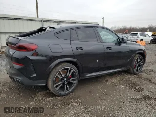 2025 BMW X6 M60i with VIN 5UX43EX02S9W76491, listed as a Copart auction lot 85033264 with 5,173 mi miles and Salvage Title. Bid and sale history available at carsss.com. Image 3.