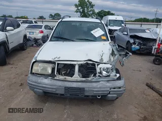 1999 Chevrolet Tracker with VIN 2CNBE13C6X6925210, listed as a IAAI auction lot 42395915 with 156,201 mi miles and . Bid and sale history available at DreamBid. Image 13.