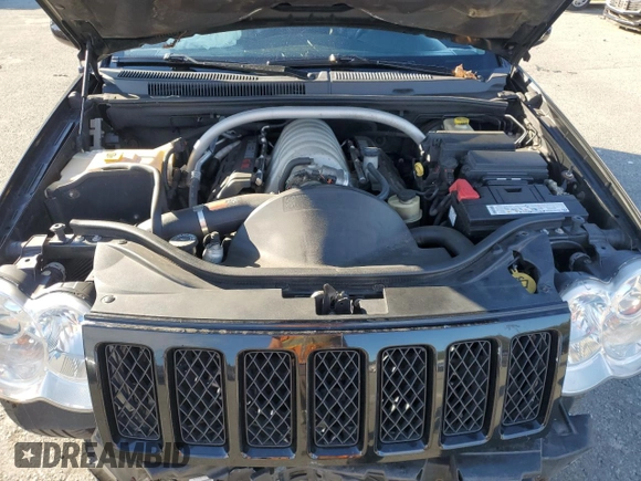 2008 Jeep Grand Cherokee SRT-8 with VIN 1J8HR78368C152318, listed as a Copart auction lot 74203604 with 157,840 mi miles and Salvage Title. Bid and sale history available at carsss.com. Image 13.