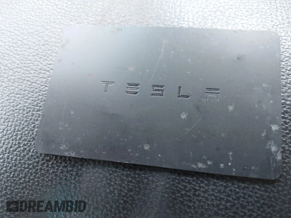 2018 Tesla Model 3 Long Range Battery with VIN 5YJ3E1EAXJF027179, listed as a IAAI auction lot 42059918 with 43,566 mi miles. Bid and sale history available at carsss.com. Image 11.