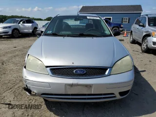 2007 Ford Focus S with VIN 1FAFP34N77W162007, listed as a Copart auction lot 60262625 with 182,844 mi miles and Clean title. Bid and sale history available at DreamBid. Image 5.