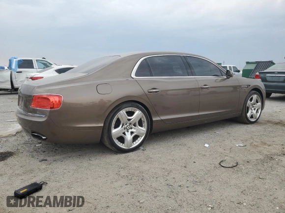 2014 Bentley Flying Spur с VIN SCBEC9ZA9EC091162, выставлен на аукционе Copart как лот 55941855 с пробегом 135 032 миль миль и Списание • Salvage title. История ставок и продаж доступна на DreamBid. Изображение 3.