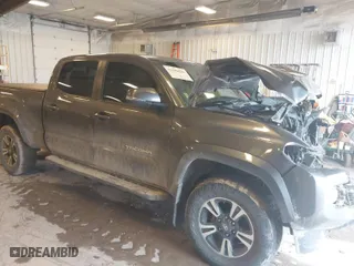 2016 Toyota Tacoma SR5 with VIN 5TFDZ5BN8GX012377, listed as a IAAI auction lot 41688620 with NaN miles. Bid and sale history available at carsss.com. Image 1.