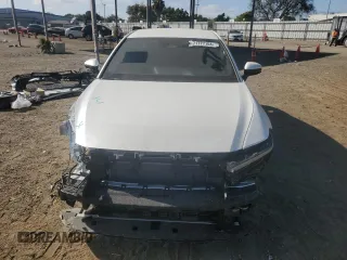 2024 Toyota Crown XLE with VIN JTDAAAAF2R3025634, listed as a Copart auction lot 71777104 with 4,303 mi miles and Salvage Title. Bid and sale history available at carsss.com. Image 5.