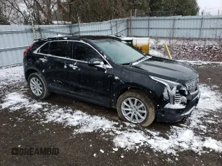 2023 Cadillac XT4 FWD Luxury с VIN 1GYAZAR40PF168776, выставлен на аукционе Copart как лот 50130855 с пробегом 67 048 миль миль и Чистый • Clean title. История ставок и продаж доступна на DreamBid. Изображение 4.