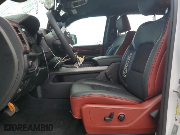 2025 Ram 1500 Rebel z VIN 1C6SRFLP7SN584078, wystawiony jako Copart lot #64027035 z przebiegiem 7 584 mil mil oraz Czysty tytuł • Clean title. Historia ofert i sprzedaży dostępna na DreamBid. Obrazek 7.