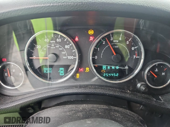 2013 Jeep Wrangler Unlimited Sport z VIN 1C4BJWDG9DL509685, wystawiony jako Copart lot #58521415 z przebiegiem 254 452 mil mil oraz Szkoda całkowita • Salvage title. Historia ofert i sprzedaży dostępna na DreamBid. Obrazek 9.
