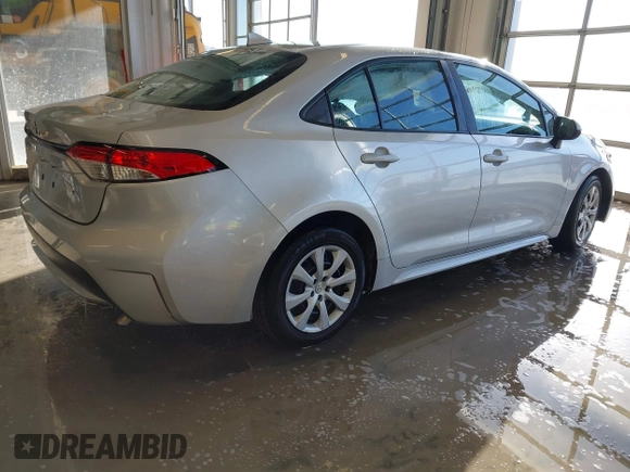 2021 Toyota Corolla LE with VIN 5YFEPMAE0MP214064, listed as a IAAI auction lot 41631520 with 77,396 mi miles and . Bid and sale history available at DreamBid. Image 4.