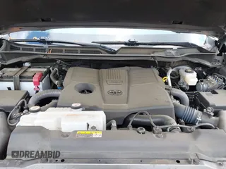 2022 Toyota Tundra 1794 Edition with VIN 5TFMA5AB1NX006173, listed as a IAAI auction lot 41880463 with 48,923 mi miles and . Bid and sale history available at DreamBid. Image 10.