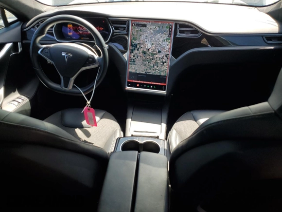 2016 Tesla Model S 90D with VIN 5YJSA1E22GF177120, listed as a Copart auction lot 51972885 with 73,441 mi miles and Salvage title. Bid and sale history available at DreamBid. Image 8.