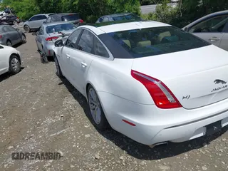 2015 Jaguar XJ with VIN SAJWA1CZ0F8V75119, listed as a IAAI auction lot 42248663 with 94,060 mi miles and . Bid and sale history available at DreamBid. Image 3.