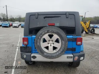 2012 Jeep Wrangler Arctic z VIN 1C4AJWBG3CL148046, wystawiony jako Copart lot #54186285 z przebiegiem 156 639 mil mil oraz Szkoda całkowita • Salvage title. Historia ofert i sprzedaży dostępna na DreamBid. Obrazek 6.