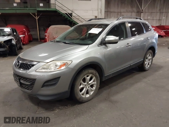 2012 Mazda CX-9 Touring with VIN JM3TB3CVXC0344611, listed as a IAAI auction lot 42473967 with 242,015 mi miles and . Bid and sale history available at DreamBid. Image 2.