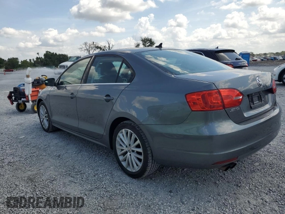 2014 Volkswagen Jetta TDI w/Premium with VIN 3VWLL7AJ7EM436916, listed as a Copart auction lot 58238385 with 103,265 mi miles and Salvage title. Bid and sale history available at DreamBid. Image 2.
