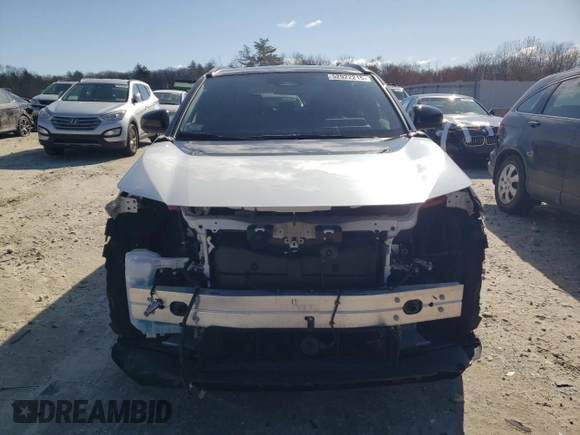 2023 Toyota bZ4X XLE with VIN JTMABACA9PA041997, listed as a Copart auction lot 52922215 with 6,490 mi miles and Salvage Title. Bid and sale history available at DreamBid. Image 5.