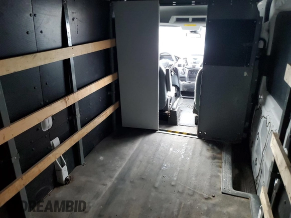 2017 Ford Transit z VIN 1FTYR2XM0HKA03493, wystawiony jako Copart lot #70397104 z przebiegiem 133 839 mil mil oraz Szkoda całkowita • Salvage title. Historia ofert i sprzedaży dostępna na DreamBid. Obrazek 11.