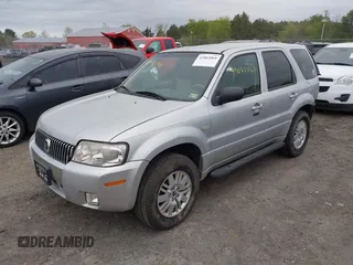 2005 Mercury Mariner Convenience z VIN 4M2YU57Z55DJ18600, wystawiony jako IAAI lot #42082068 z przebiegiem 141 530 mil mil oraz . Historia ofert i sprzedaży dostępna na DreamBid. Obrazek 2.