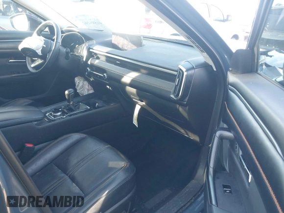 2023 Mazda CX-50 S Premium Plus with VIN 7MMVABEM2PN102083, listed as a IAAI auction lot 41589242 with 75,373 mi miles and . Bid and sale history available at DreamBid. Image 5.