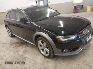 2015 Audi allroad A4 Premium z VIN WA1TFAFL3FA001319, wystawiony jako IAAI lot #42063798 z przebiegiem 70 079 mil mil oraz . Historia ofert i sprzedaży dostępna na DreamBid. Obrazek 1.