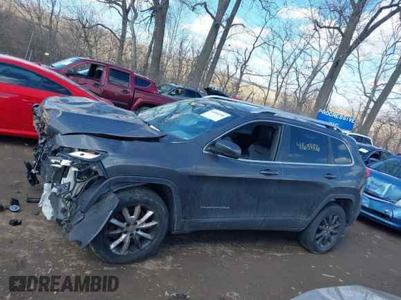 2015 Jeep Cherokee Limited with VIN 1C4PJMDB7FW591772, listed as a IAAI auction lot 41684106 with 118,708 mi miles and . Bid and sale history available at DreamBid. Image 14.
