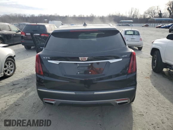 2023 Cadillac XT5 FWD Premium Luxury z VIN 1GYKNCRS6PZ145494, wystawiony jako Copart lot #45475375 z przebiegiem 48 339 mil mil oraz Szkoda całkowita • Salvage title. Historia ofert i sprzedaży dostępna na DreamBid. Obrazek 6.
