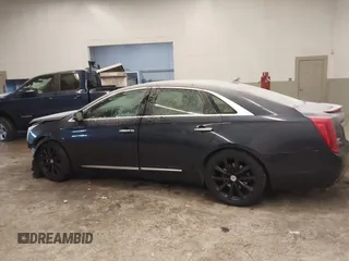2013 Cadillac XTS Luxury with VIN 2G61P5S34D9200849, listed as a IAAI auction lot 41412189 with 134,932 mi miles. Bid and sale history available at carsss.com. Image 14.