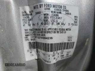 2005 Ford F-150 XL with VIN 1FTRF12275NB94238, listed as a Copart auction lot 49893695 with 283,085 mi miles and Salvage title. Bid and sale history available at DreamBid. Image 14.