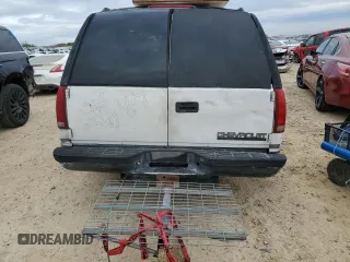 1999 Chevrolet Suburban with VIN 1GNEC16R7XJ418169, listed as a Copart auction lot 88995495 with 2,015,240 mi miles and Salvage title. Bid and sale history available at DreamBid. Image 6.