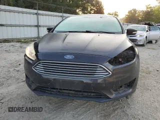 2015 Ford Focus Titanium with VIN 1FADP3N23FL346078, listed as a Copart auction lot 61991195 with 188,014 mi miles and Salvage title. Bid and sale history available at DreamBid. Image 6.