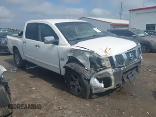 2004 Nissan Titan LE z VIN 1N6AA07B74N581334, wystawiony jako IAAI lot #42265633 z przebiegiem 189 892 mil mil oraz . Historia ofert i sprzedaży dostępna na DreamBid. Obrazek 1.