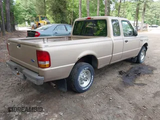 1996 Ford Ranger Splash with VIN 1FTCR14X6TTA69715, listed as a IAAI auction lot 42220603 with 292,607 mi miles and . Bid and sale history available at DreamBid. Image 4.