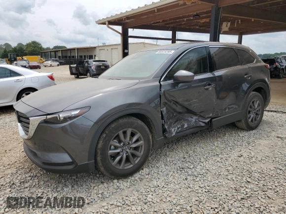 2020 Mazda CX-9 Touring z VIN JM3TCACY3L0411822, wystawiony jako Copart lot #60323295 z przebiegiem 61 348 mil mil oraz Szkoda całkowita • Salvage title. Historia ofert i sprzedaży dostępna na DreamBid. Obrazek 1.