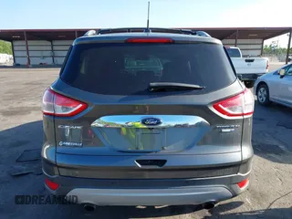2016 Ford Escape Titanium with VIN 1FMCU9J94GUA63359, listed as a IAAI auction lot 41954514 with 94,315 mi miles. Bid and sale history available at carsss.com. Image 16.
